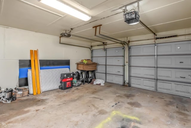 garage featuring a garage door opener