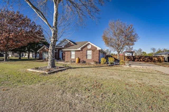 ranch-style home with a front yard