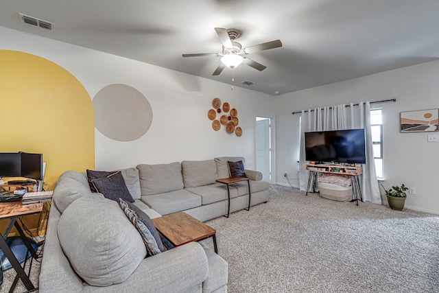 living room with carpet floors and ceiling fan