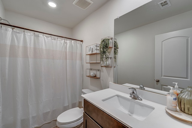 full bathroom featuring toilet, shower / tub combo, and vanity