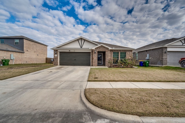 ranch-style house with a garage and a front yard