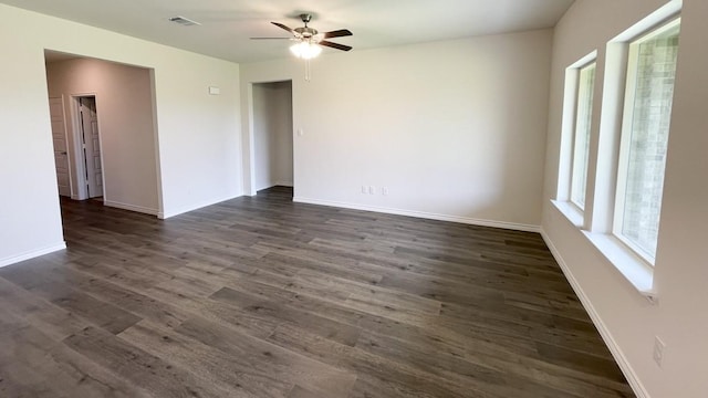 4224 Lucy Ln, Sherman, TX 75090 - unfurnished room with a ceiling fan, dark wood-style floors, and baseboards