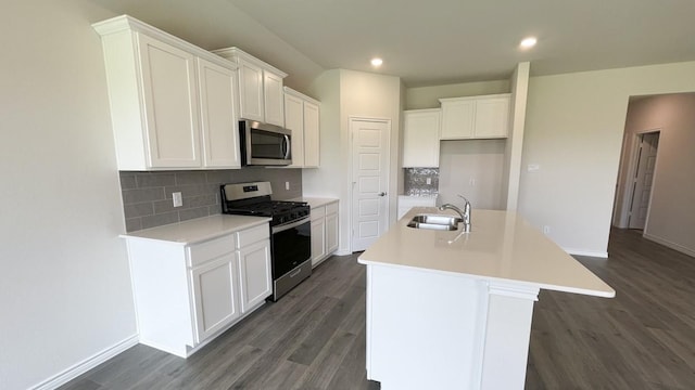 4224 Lucy Ln, Sherman, TX 75090 - kitchen with stainless steel appliances, a sink, dark wood-type flooring, and recessed lighting