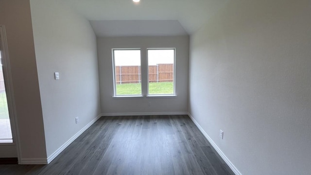 4224 Lucy Ln, Sherman, TX 75090 - unfurnished room with dark wood-style floors, baseboards, and vaulted ceiling