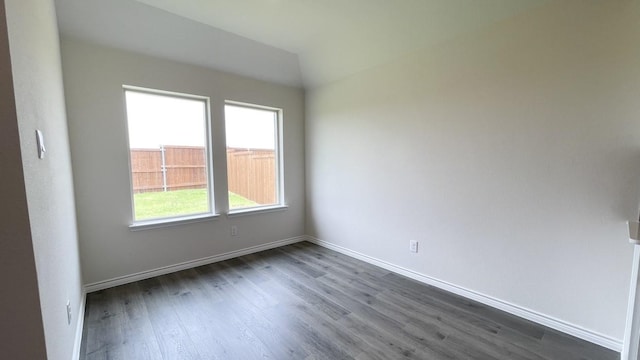 4224 Lucy Ln, Sherman, TX 75090 - spare room featuring dark wood-type flooring and baseboards