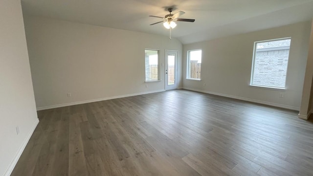4219 Sky Dr, Sherman, TX 75090 - unfurnished room featuring a ceiling fan, dark wood finished floors, and baseboards