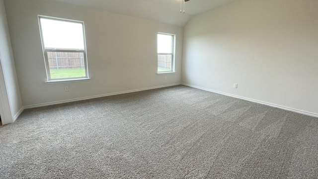 4219 Sky Dr, Sherman, TX 75090 - spare room with a ceiling fan, baseboards, carpet, and vaulted ceiling