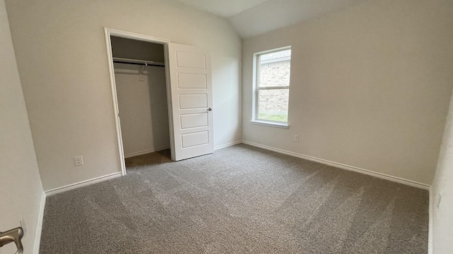 4219 Sky Dr, Sherman, TX 75090 - unfurnished bedroom featuring carpet, lofted ceiling, baseboards, and a closet