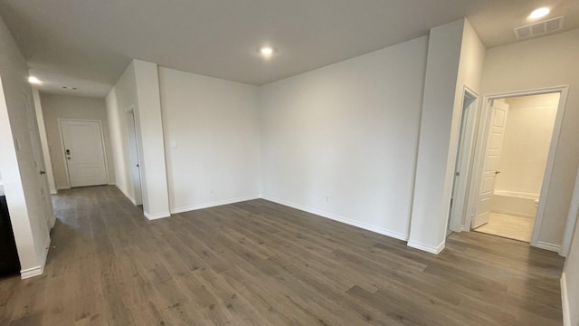 4219 Sky Dr, Sherman, TX 75090 - unfurnished room with wood finished floors, baseboards, and recessed lighting