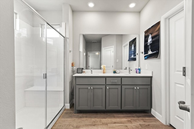 bathroom featuring vanity and walk in shower