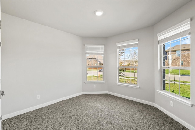 unfurnished room with carpet