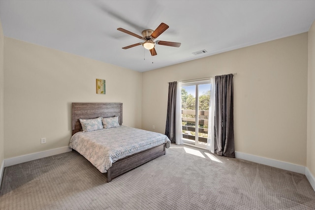 carpeted bedroom with access to exterior and ceiling fan