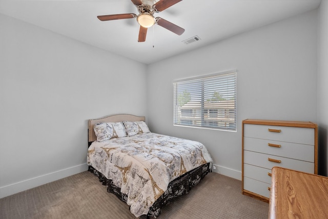 bedroom featuring ceiling fan and light colored carpet