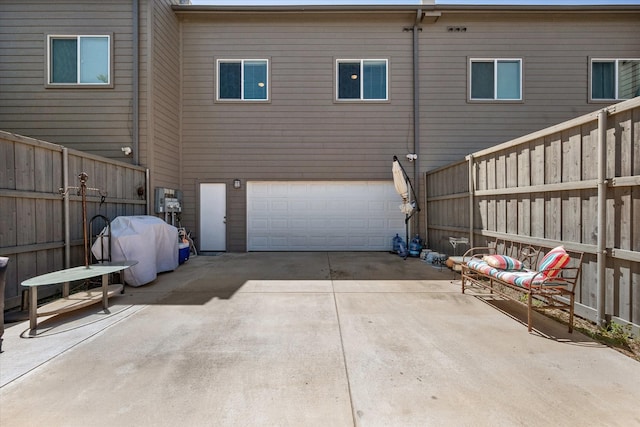 exterior space with a garage