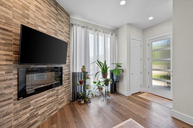 foyer entrance with hardwood / wood-style flooring