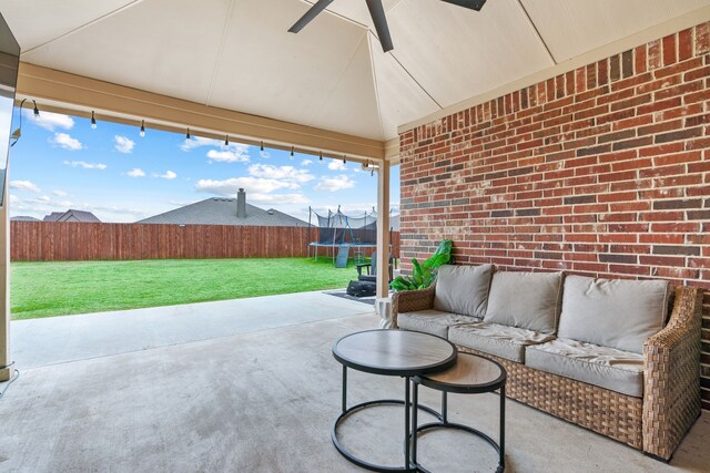 view of patio featuring outdoor lounge area and a trampoline