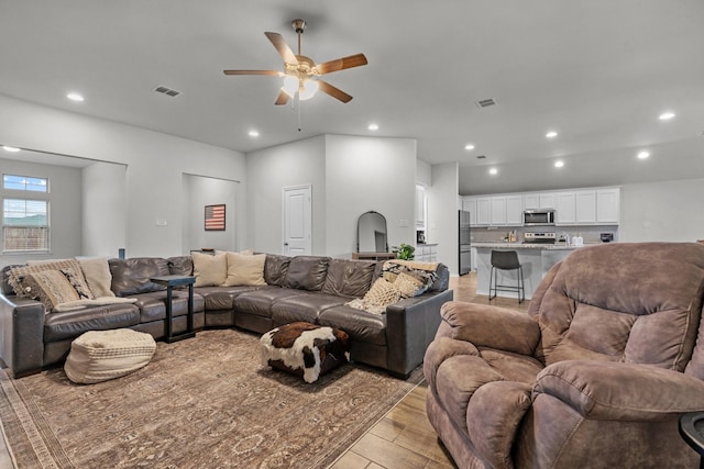 living room with ceiling fan