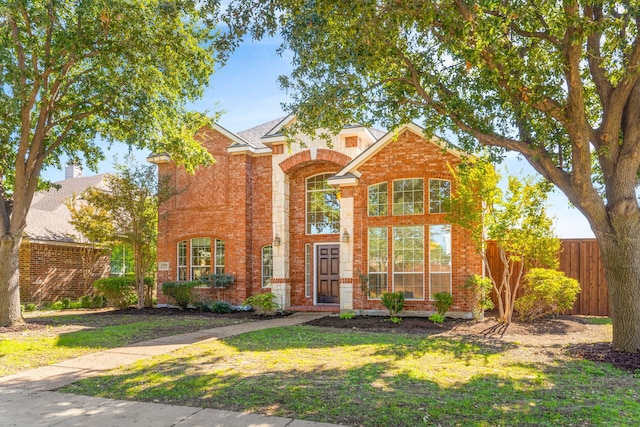 view of front property featuring a front yard