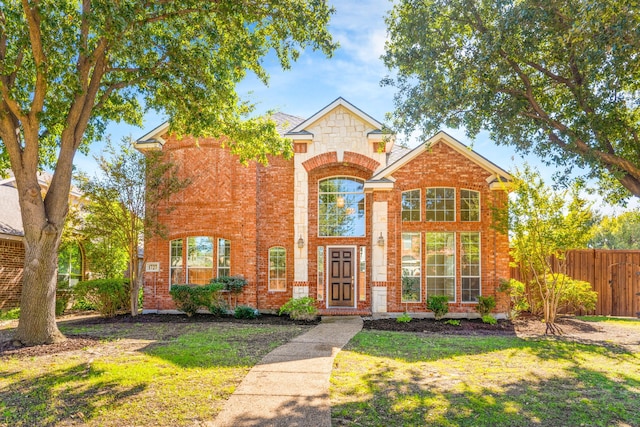 view of property with a front lawn