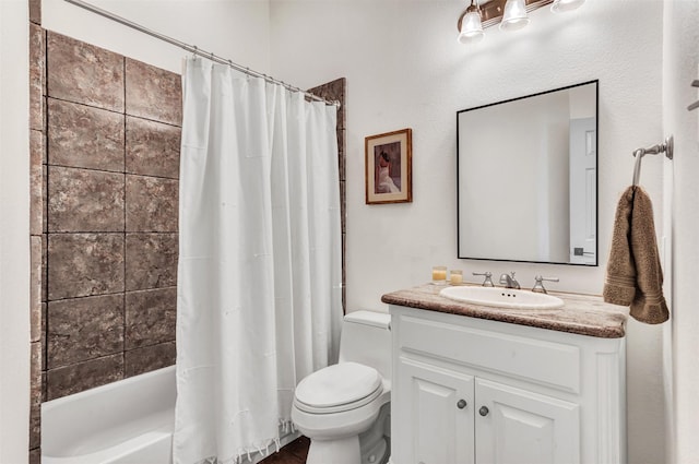 full bathroom featuring vanity, shower / bath combo with shower curtain, and toilet