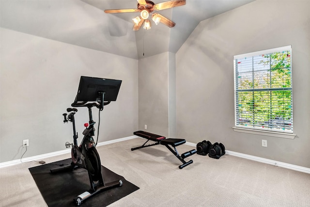 workout room with lofted ceiling, light colored carpet, and ceiling fan