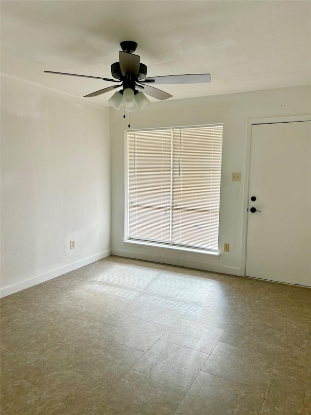 empty room featuring ceiling fan