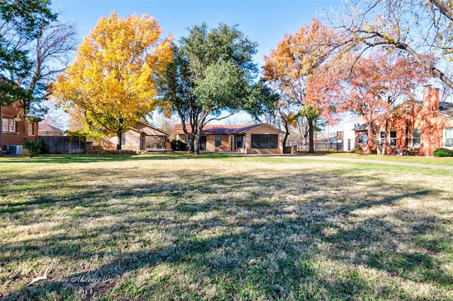 view of yard with central AC