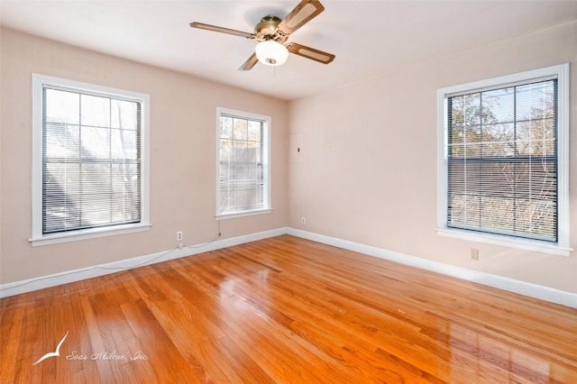 unfurnished room featuring ceiling fan and wood-type flooring