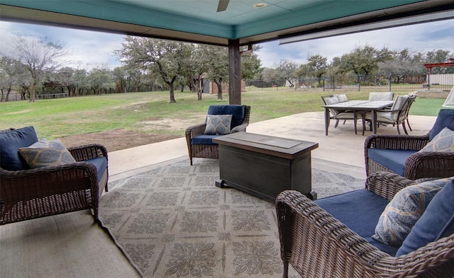 view of patio featuring an outdoor living space and ceiling fan