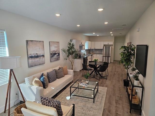 living room featuring hardwood / wood-style flooring