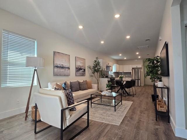 living room with hardwood / wood-style floors