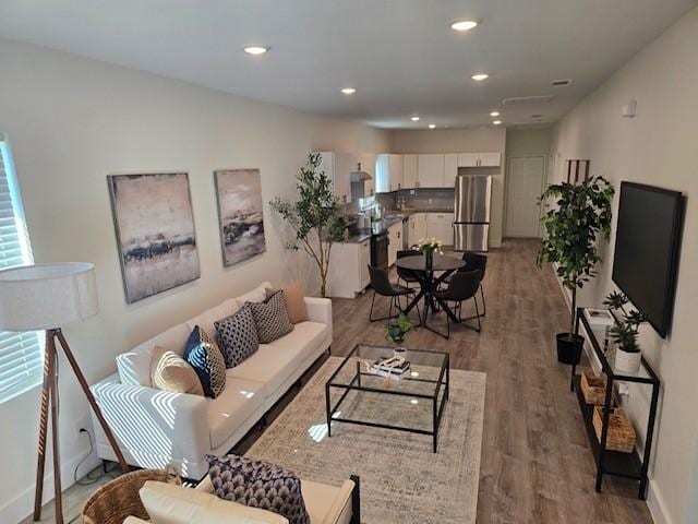 living room featuring light hardwood / wood-style flooring