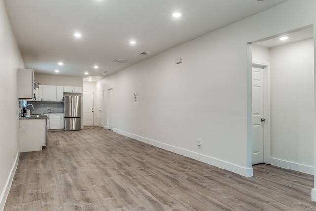 interior space with light hardwood / wood-style floors