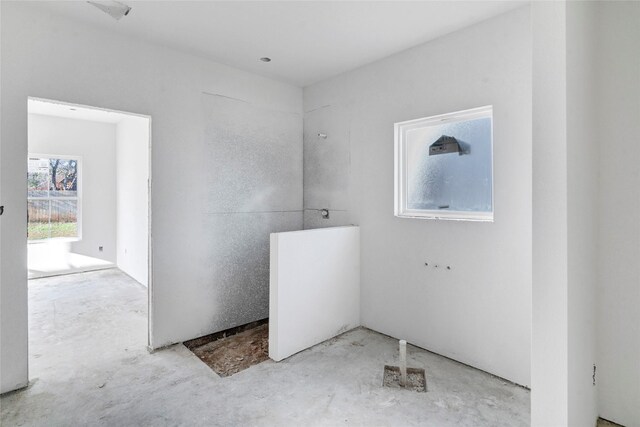 interior space with concrete floors