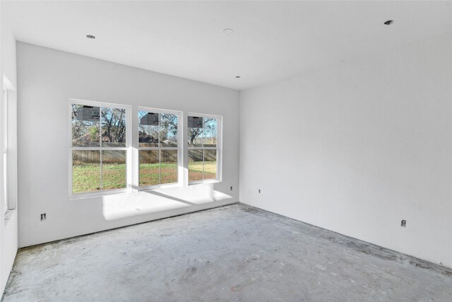 empty room featuring concrete floors