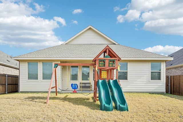 exterior space with a yard and a fenced backyard