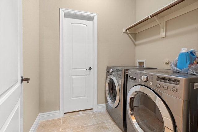 laundry area with washing machine and dryer