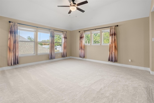 unfurnished room featuring carpet flooring, ceiling fan, and lofted ceiling