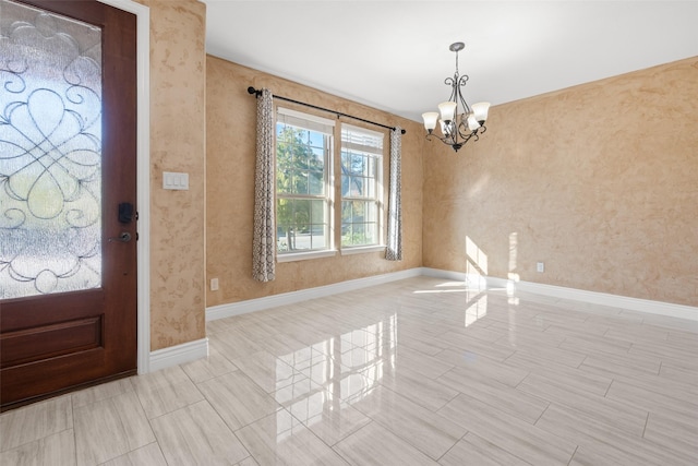 entrance foyer with an inviting chandelier