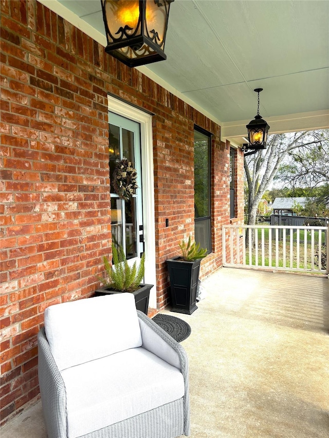 view of patio featuring a porch