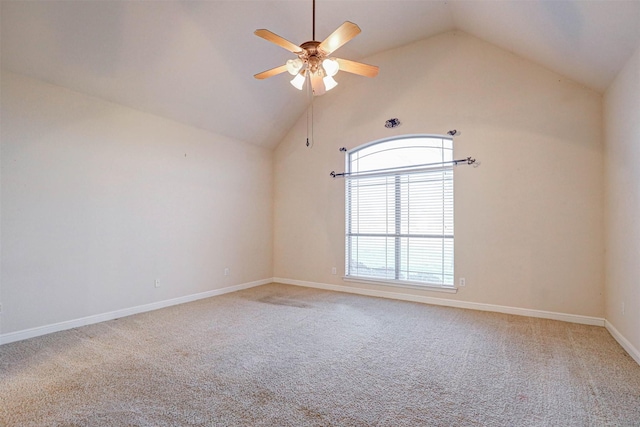 empty room featuring ceiling fan, high vaulted ceiling, and carpet