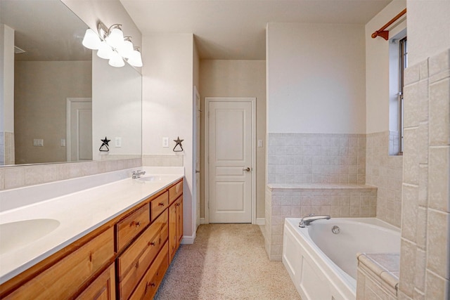 bathroom featuring a tub and vanity