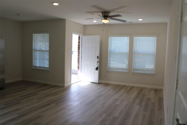 entrance foyer featuring dark hardwood / wood-style floors and ceiling fan