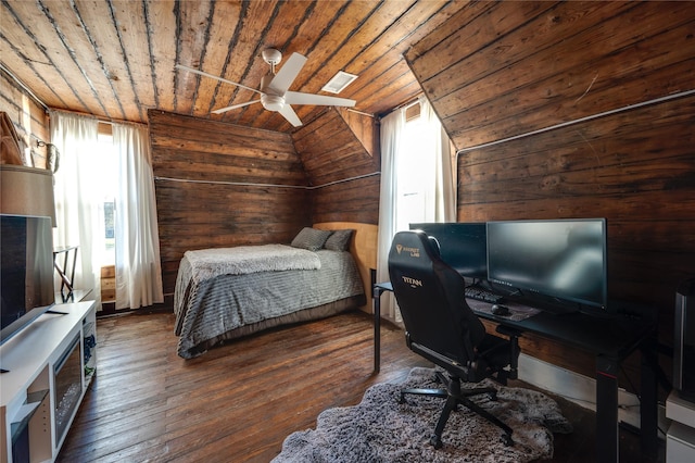 bedroom with dark hardwood / wood-style flooring, vaulted ceiling, wood ceiling, and wood walls