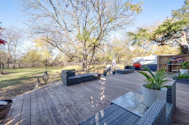 wooden terrace featuring an outdoor hangout area