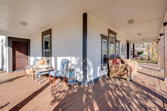 wooden deck featuring covered porch