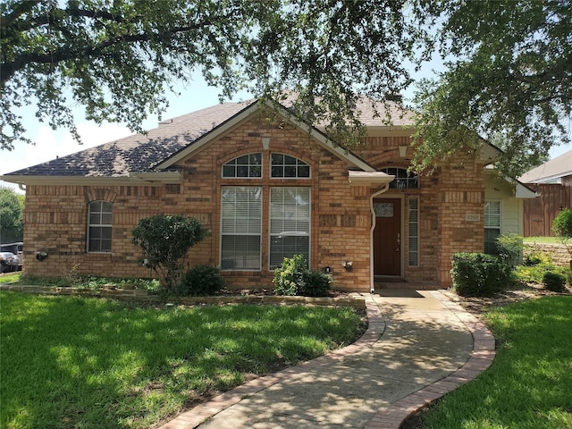 view of front of house with a front lawn