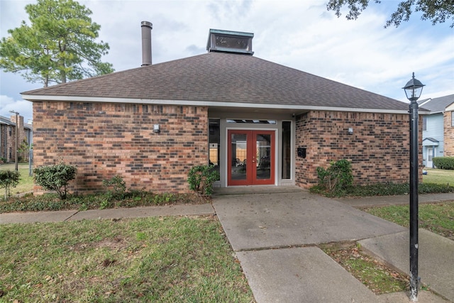 doorway to property featuring french doors