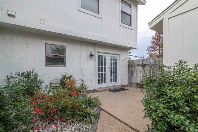 doorway to property featuring french doors and a patio