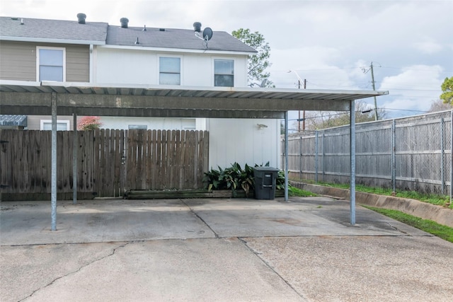 exterior space featuring a carport